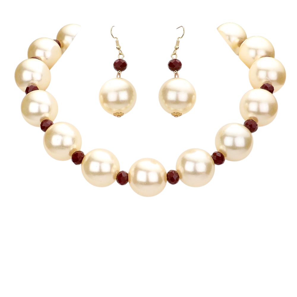 Burgundy Cream Chunky Pearl Necklace is a timeless accessory for any occasion. Made from high-quality pearls, it exudes elegance and sophistication. Its chunky design adds a touch of modernity to a classic piece. Make a statement with this necklace that is sure to turn heads and elevate any outfit.
