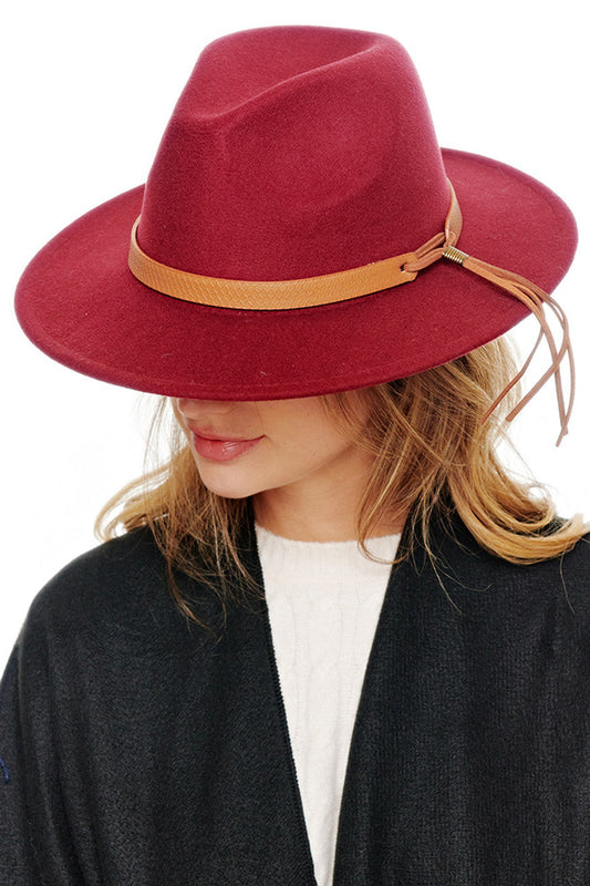 Burgundy Felt solid Fedora hat offers timeless sophistication with exceptional durability. The classic silhouette features a structured crown and well-proportioned brim that provides both style and practical sun protection. Its versatile design transitions seamlessly from casual to formal occasions, making it an essential addition to any discerning wardrobe.