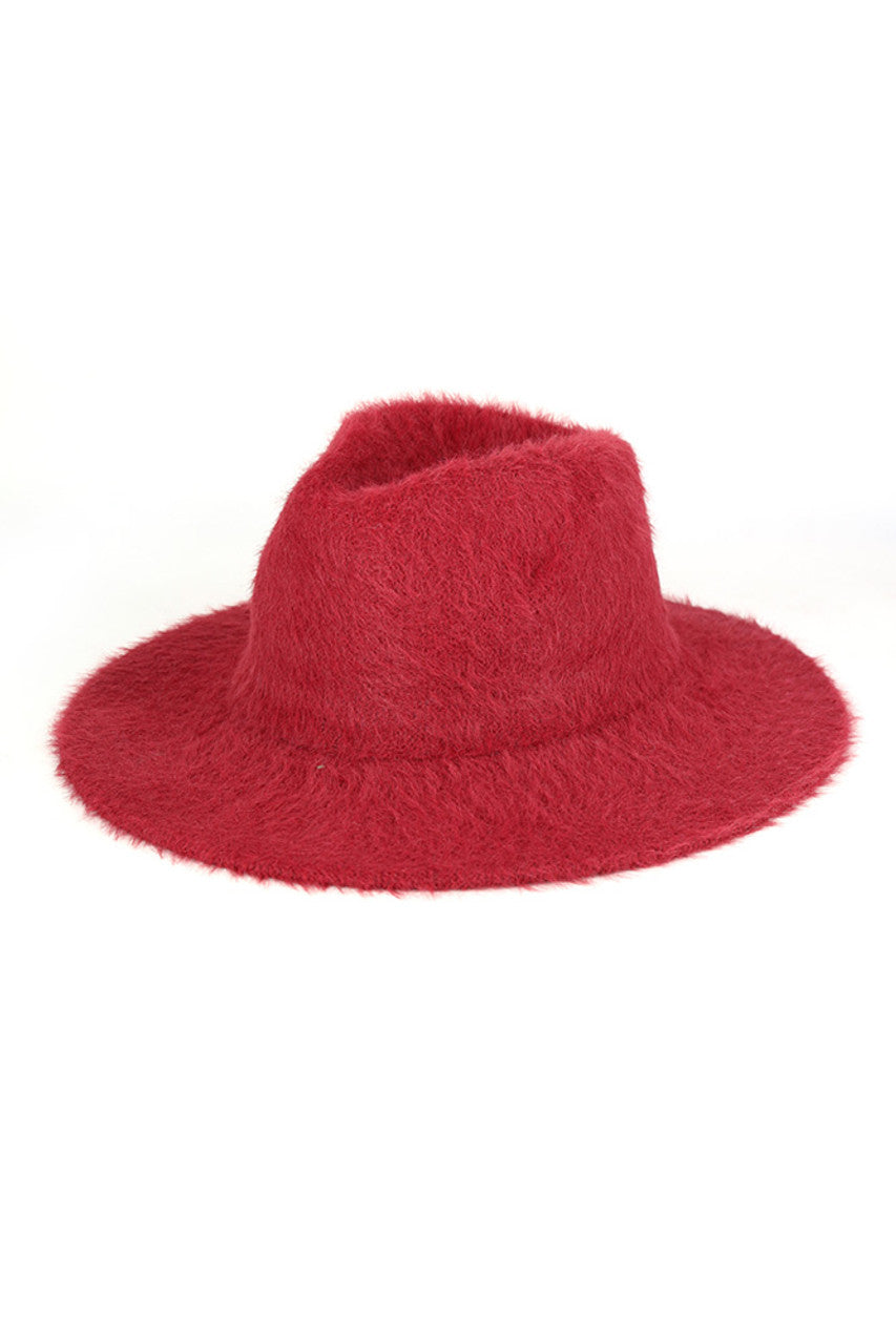 Burgundy Fuzzy Palin Solid Winter Fedora Hat merges classic silhouette with cold-weather functionality. Constructed with premium insulating materials, this fedora maintains structural integrity while providing superior warmth. The textured exterior offers both thermal protection and sophisticated styling, while the traditional brim provides practical shielding from winter elements. Designed for discerning individuals who refuse to compromise style for seasonal practicality.