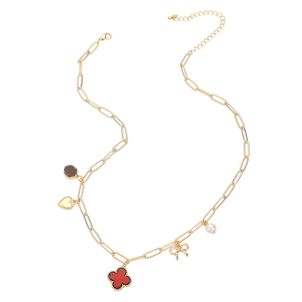 Burgundy Gold Quatrefoil Bow Heart Pearl Charm Station Paperclip Chain Necklace is expertly crafted with a unique design, combining a delicate paperclip chain with charming quatrefoil, bow, and pearl details. Made with high-quality materials, this necklace is elegant and versatile, perfect for any occasion.