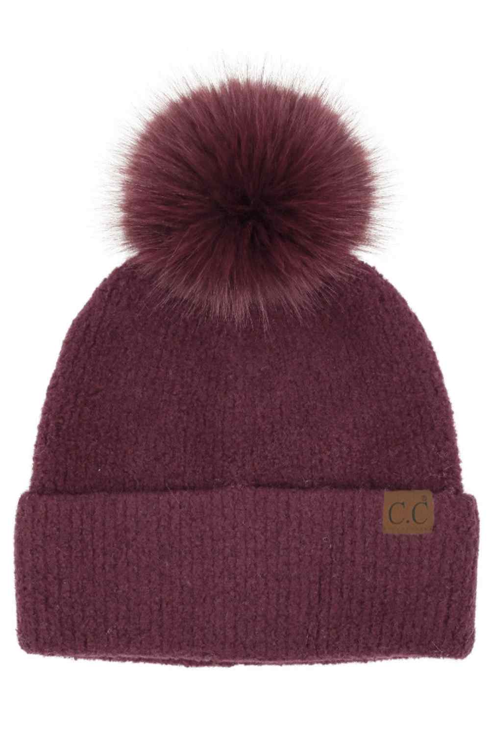 Burgundy C.C Plush Terry Chenille Pom Beanie Winter Hat&nbsp;combines superior thermal protection with refined style. Constructed from premium terry chenille fabric, this hat delivers exceptional insulation while maintaining breathability. The distinctive pom accent adds visual interest without compromising functionality. Designed with precise dimensions to ensure optimal coverage of ears and forehead, this cold-weather essential maintains its structural integrity throughout extended wear.