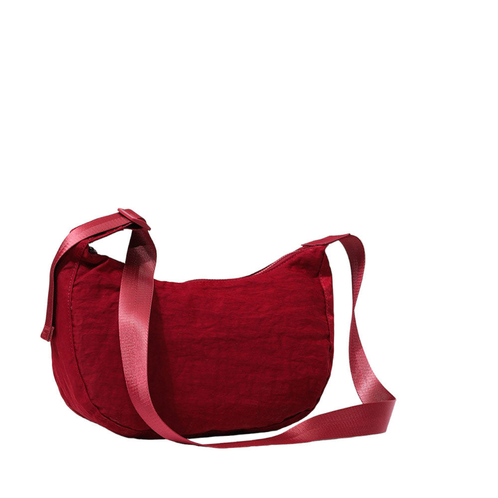 Burgundy Solid Nylon Sling Bag Crossbody Bag, is perfect to carry all your handy items with ease. This handbag features a top zipper closure for security that makes your life easier and trendier. This is the perfect gift idea for a birthday, holiday, Christmas, anniversary, Valentine's Day, etc.