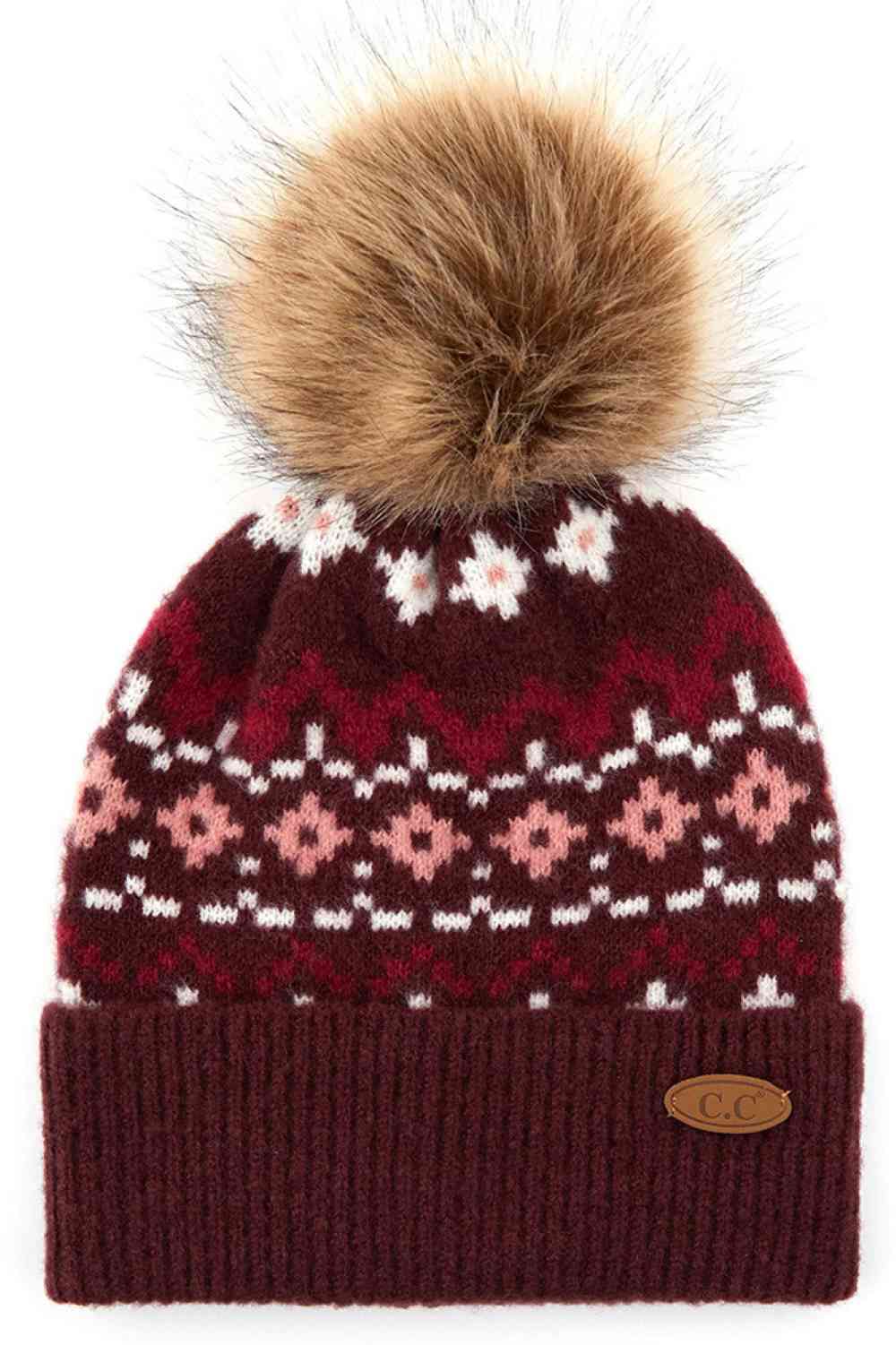 Burgundy Elevate your winter wardrobe with the C.C Geo-Ethnic Pattern Beanie Hat, featuring a striking geometric design inspired by global aesthetics. The blend of 75% acrylic, 22% nylon, and 3% polyurethane creates a durable, stretchy fabric that moves with you while maintaining its shape. Perfect for layering or wearing solo, this beanie delivers warmth and contemporary flair for any season.