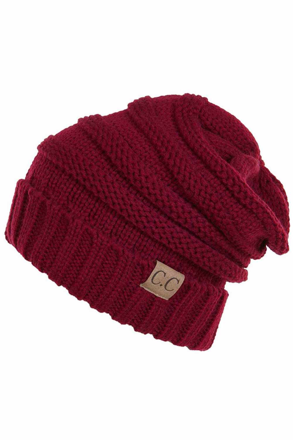 Burgundy Wrap yourself in warmth with this C.C Slouchy Knitted Beanie, crafted from 100% soft acrylic for ultimate comfort. The oversized silhouette and plush pom pom detail create a relaxed, on-trend look perfect for chilly days. Available in nine versatile colors—Beige, Berry, Dark Denim, Heather Gray, Ivory, Pistachio, Rose, Steel Blue, and Violet Purple—this beanie pairs effortlessly with any winter wardrobe. The ribbed knit construction ensures durability and a flattering fit. Hand wash and lay flat to
