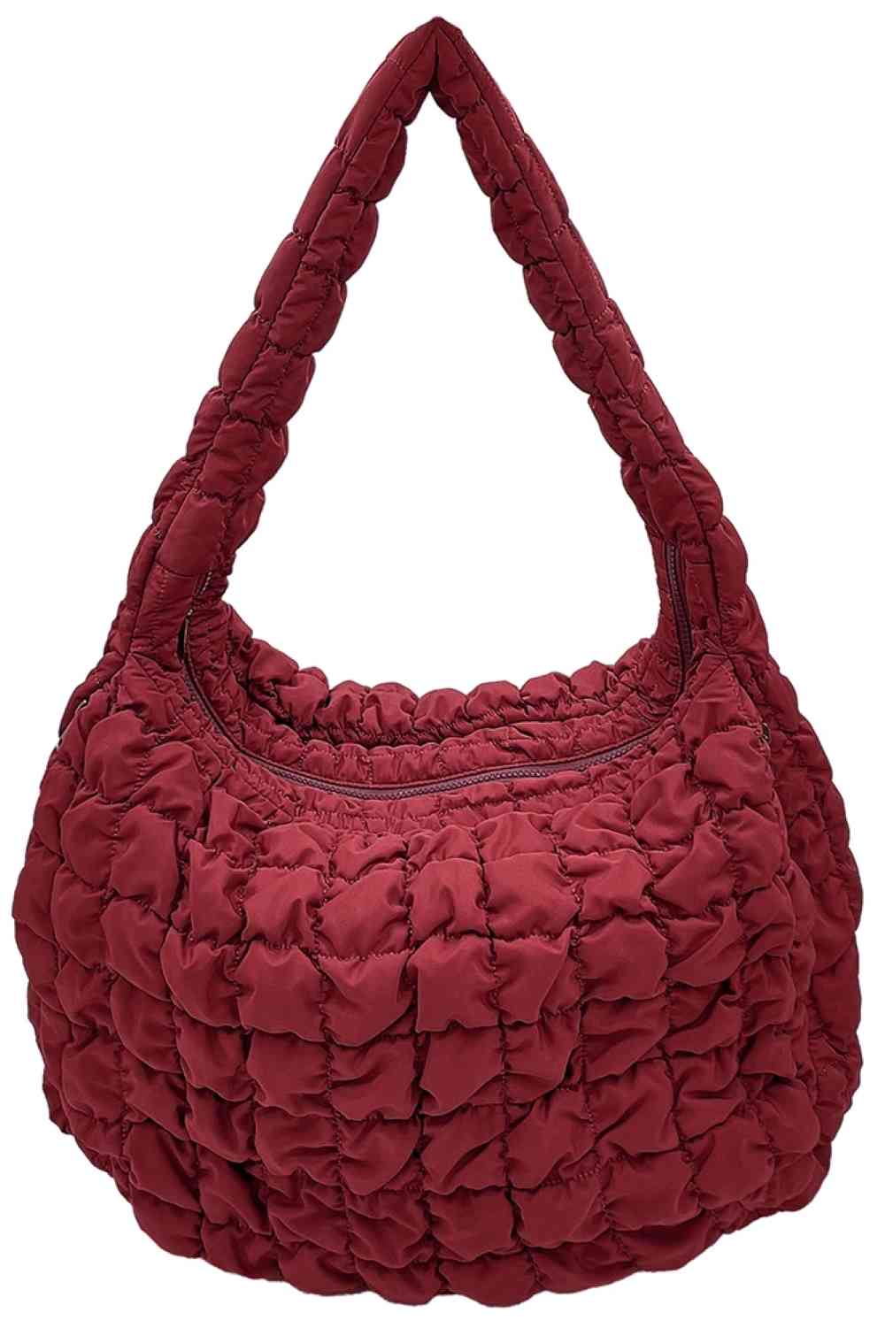 Burgundy Carry your essentials in style with this Large Quilted Solid Bag. Crafted from durable 100% polyester with a classic quilted design, it offers a sleek, versatile look that complements any outfit. The adjustable sling strap allows for comfortable crossbody wear, making it perfect for everyday errands, travel, or casual outings.