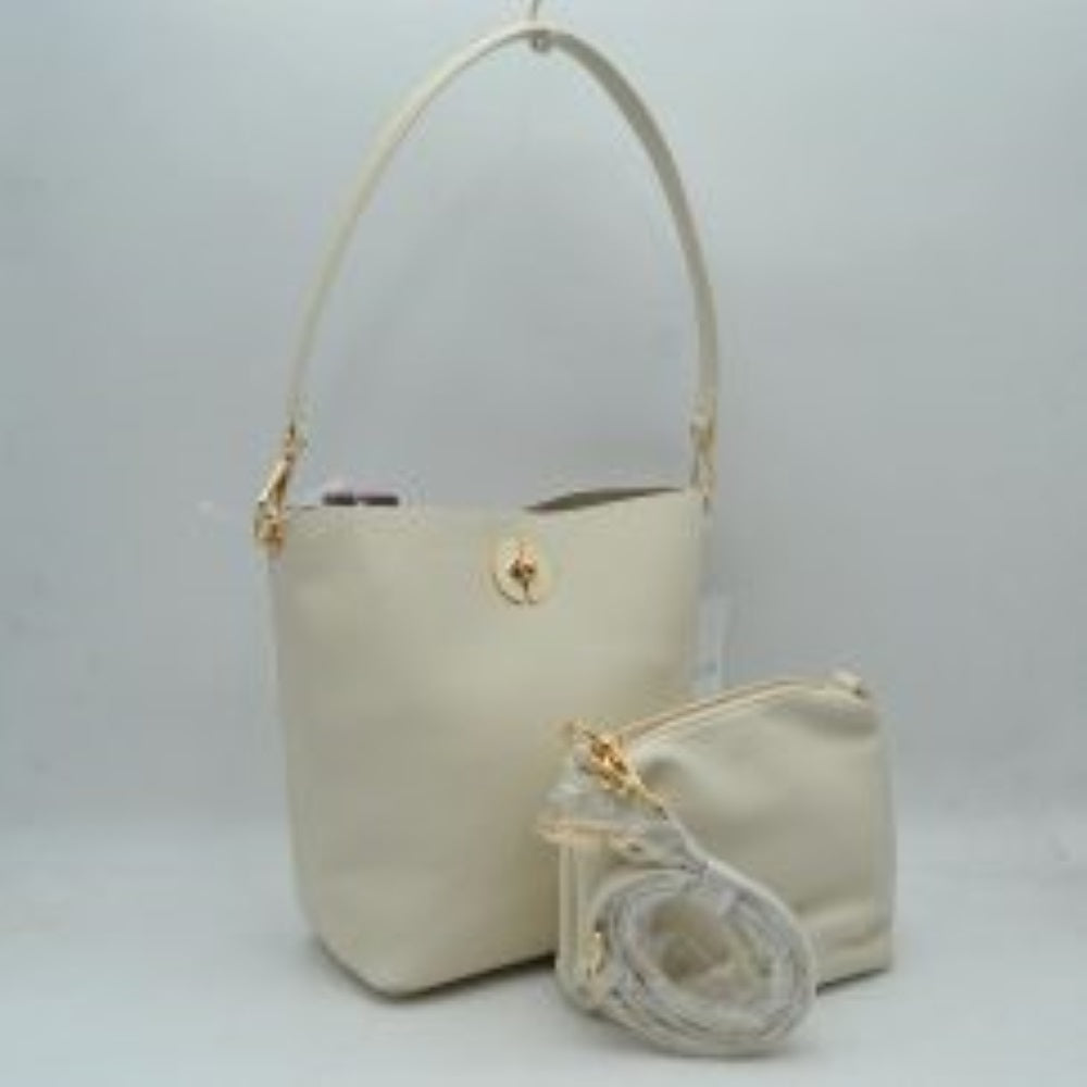 Butter cream Streamline your daily coordination with this sophisticated and highly versatile handbag set. The main bucket bag features a premium pebbled exterior finish that handles daily use with ease while maintaining an elegant, structured silhouette. A polished, circular metallic turn-lock accent sits prominently on the front, providing an upscale focal point. This functional piece comes paired with a matching