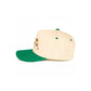 Green The C.C “Don’t Get Your Tinsel in a Tangle” Trucker Cap features a playful holiday slogan with a classic trucker silhouette for a fun, festive look. Designed with a breathable mesh back and adjustable snap closure, it offers lightweight comfort and an easy, customizable fit for everyday wear.