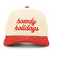 Red The C.C HOWDY HOLIDAYS Letter Trucker Cap features cheerful holiday-themed embroidered lettering for a fun, festive look. With a breathable mesh back and adjustable snap closure, it provides lightweight comfort and a customizable fit for everyday wear.