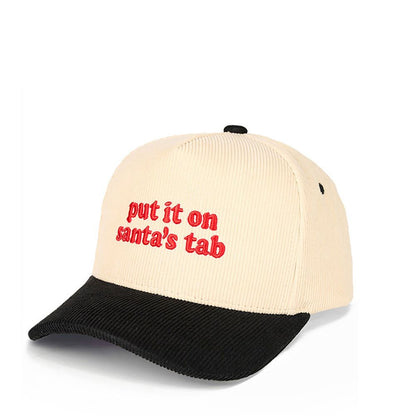 Black The C.C “PUT IT ON SANTA’S TAP” Letter Embroidered Christmas Theme Corduroy Trucker Hat Baseball Cap features playful holiday-themed embroidery on a soft corduroy front for a festive, standout style. Designed with a breathable mesh back and adjustable snap closure, it offers comfortable, lightweight wear and a customizable fit.