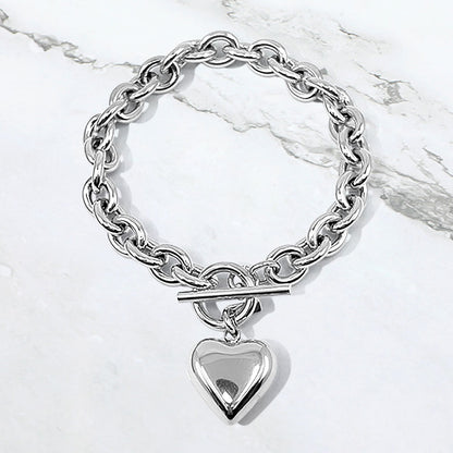Madeline Love Rhodium Stainless Steel Puffy Heart Charm Toggle Bracelet - Bracelets