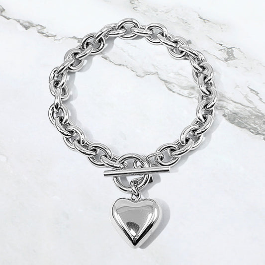 Madeline Love Rhodium Stainless Steel Puffy Heart Charm Toggle Bracelet - Bracelets