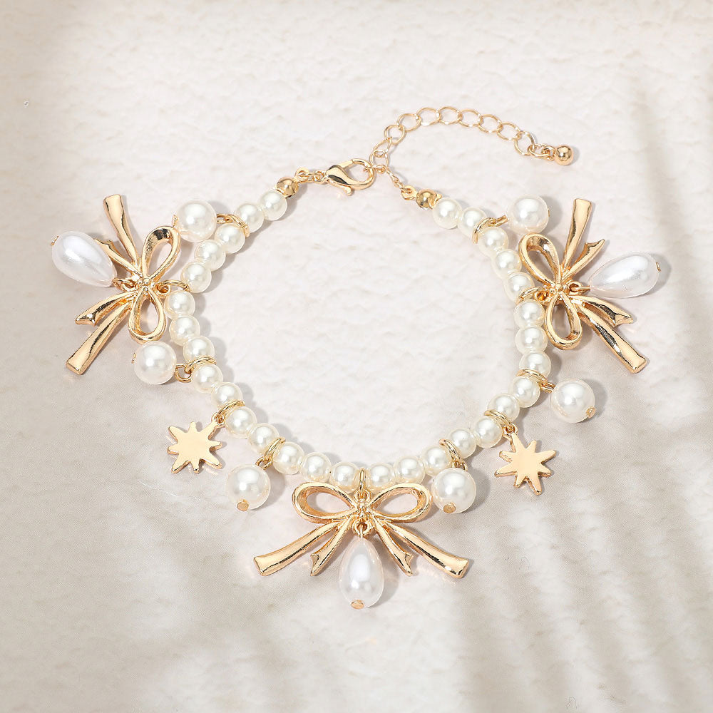 Madeline Love Cream, Gold Bow CHarm Pearl Beaded Bracelet - Bracelets