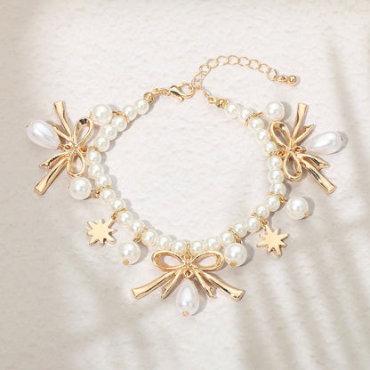 Madeline Love Cream, Gold Bow CHarm Pearl Beaded Bracelet - Bracelets