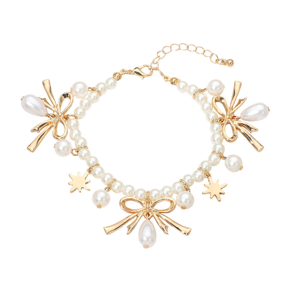 Madeline Love Cream, Gold Bow CHarm Pearl Beaded Bracelet - Bracelets - desc