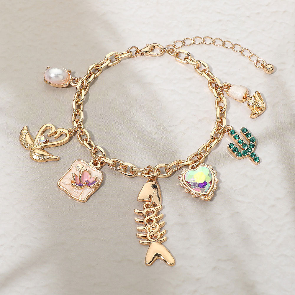 Madeline Love Gold Fishbone Heart Cactus Pearl Flower Charm Station Bracelet - Bracelets