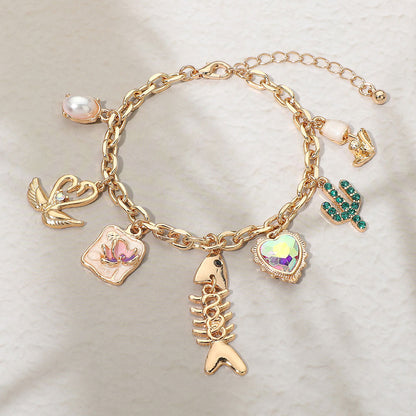 Madeline Love Gold Fishbone Heart Cactus Pearl Flower Charm Station Bracelet - Bracelets