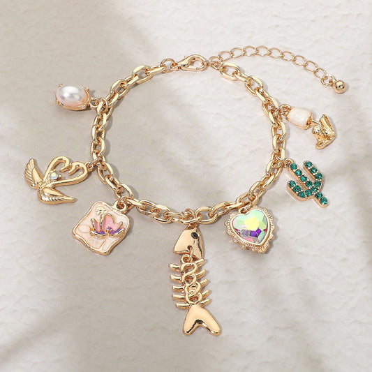 Madeline Love Gold Fishbone Heart Cactus Pearl Flower Charm Station Bracelet - Bracelets