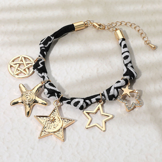 Madeline Love Black, Gold Star Charm Embellished Scarf Fabric Chain Bracelet - Bracelets