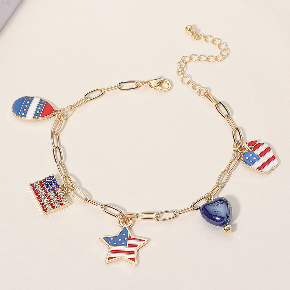 Madeline Love Gold, Multi Enamel American USA Flag Star Apple Egg Heart Charm Station Paperclip Chain Bracelet - Bracelets