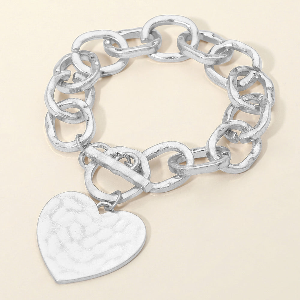 Madeline Love Worn Silver Hammered Metal Heart Charm Chunky Chain Toggle Bracelet - Bracelets