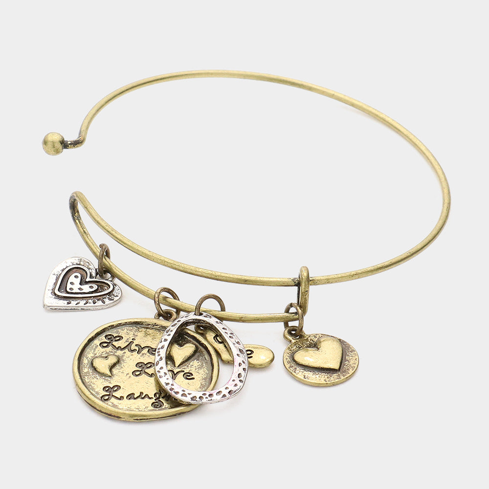 Live Love Laugh Message Heart Charm Bracelet serves as a daily reminder to live life to the fullest, love with all your heart, and find joy in every moment. Crafted with a heart-shaped charm and inspirational message, this bracelet is a beautiful accessory and a meaningful symbol. 