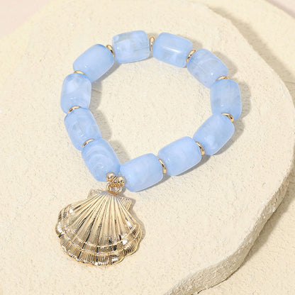 Madeline Love Gold, Light Blue Bold Textured Seashell Charm Chunky Resin Beaded Stretch Bracelet - Bracelets