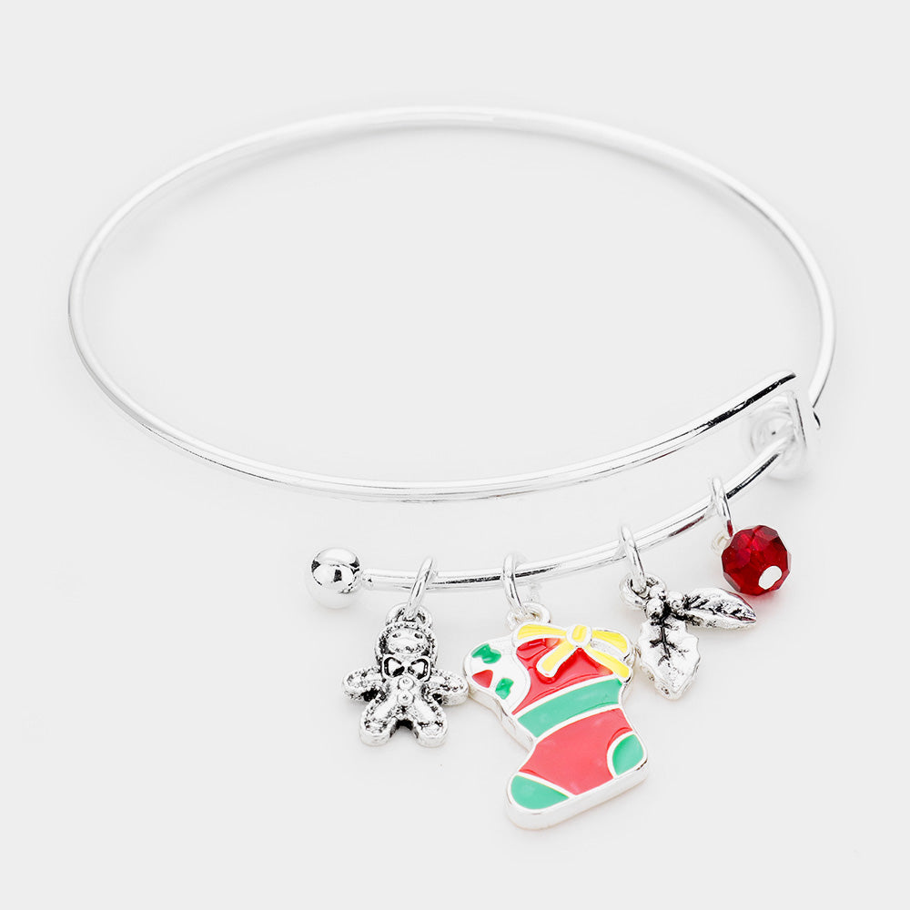 Antique Silver, Multi This Christmas Theme Charm Adjustable Bracelet features a mix of festive charms that capture the joyful essence of the holiday season. Its adjustable design provides a customizable and comfortable fit, making it a perfect accessory for celebrations or everyday seasonal style.