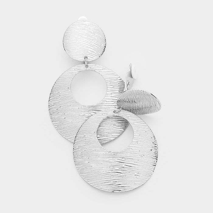 Madeline Love Rhodium Textured Cut Out Round Metal Clip On Earrings