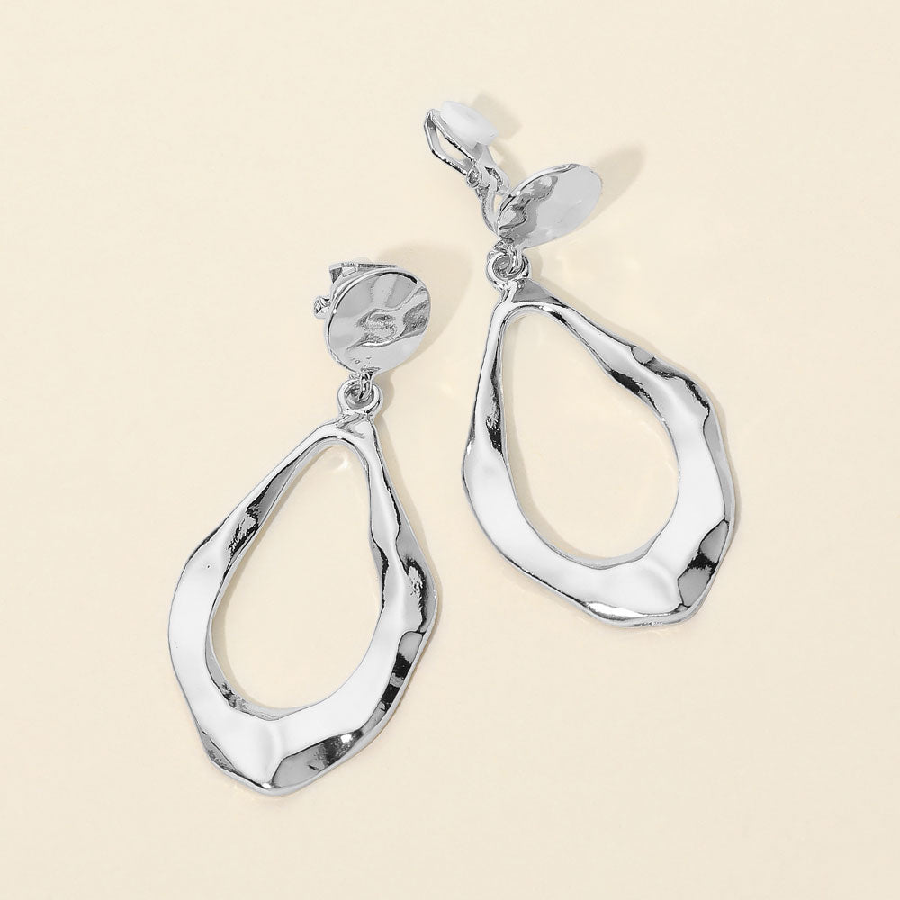 Madeline Love Silver Hammered Metal Open Teardrop Clip On Earrings