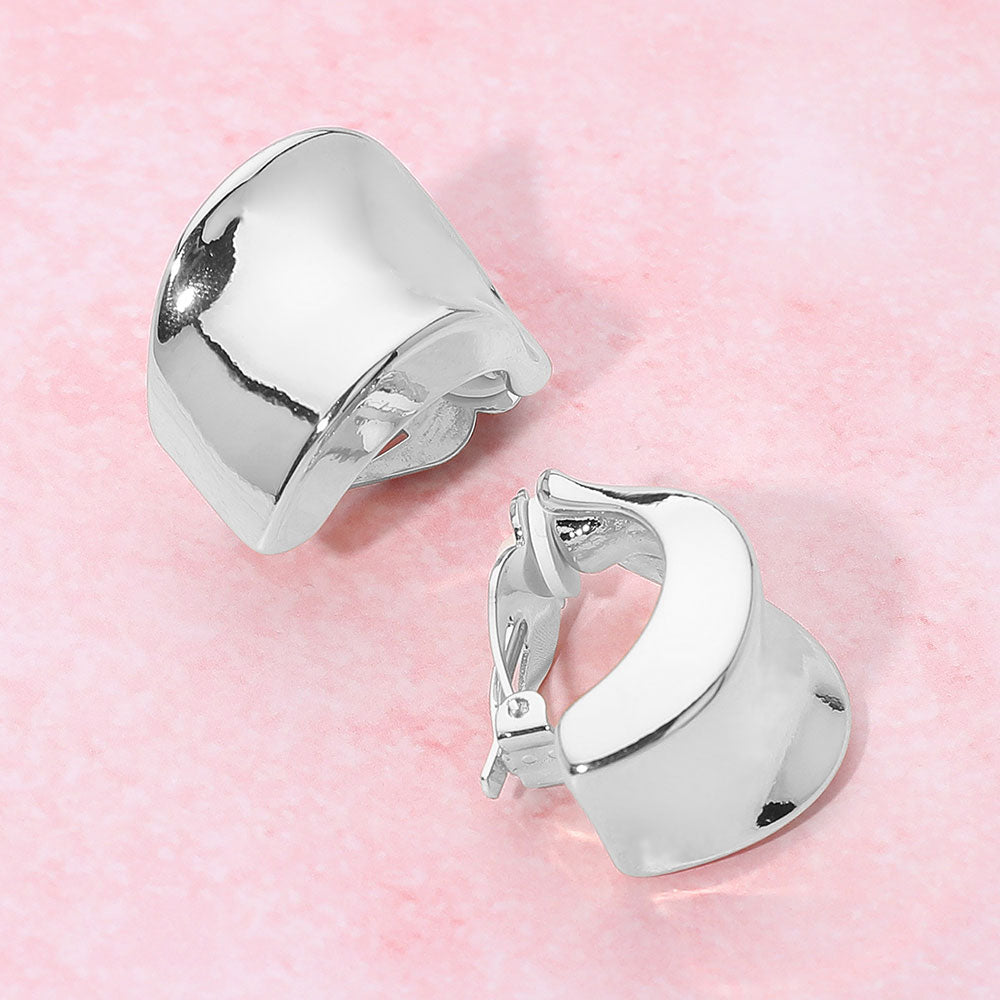 Madeline Love Rhodium Sculpted Curved Metal Clip On Earrings