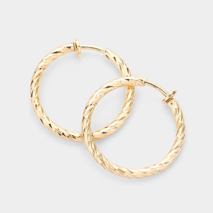 Madeline Love Gold 1.25" Textured metal hoop clip on earrings