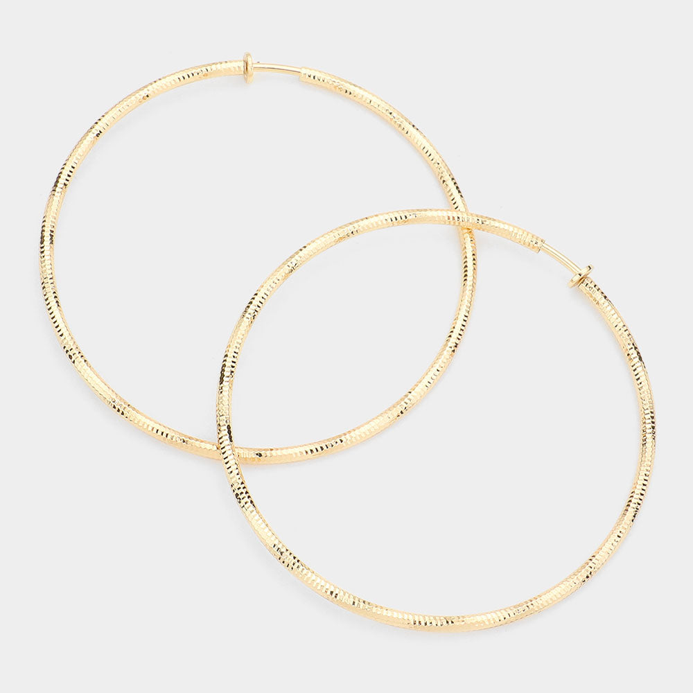 Madeline Love Gold 3.2 Inch Textured Metal Clip On Hoop Earrings