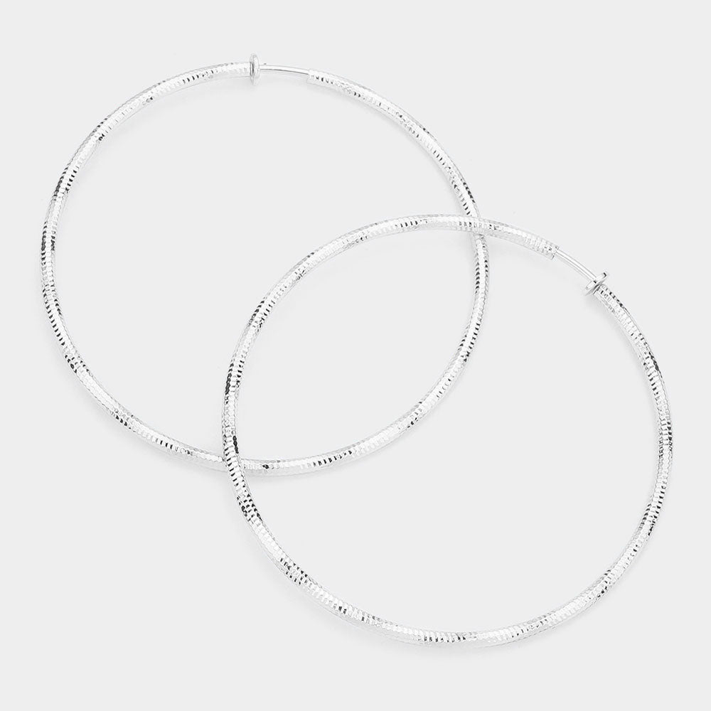 Madeline Love Silver 3.2 Inch Textured Metal Clip On Hoop Earrings
