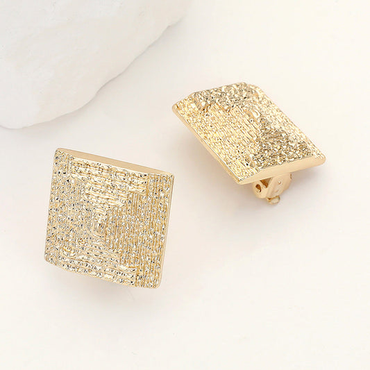 Madeline Love Gold Textured Metal Square Clip On Earrings