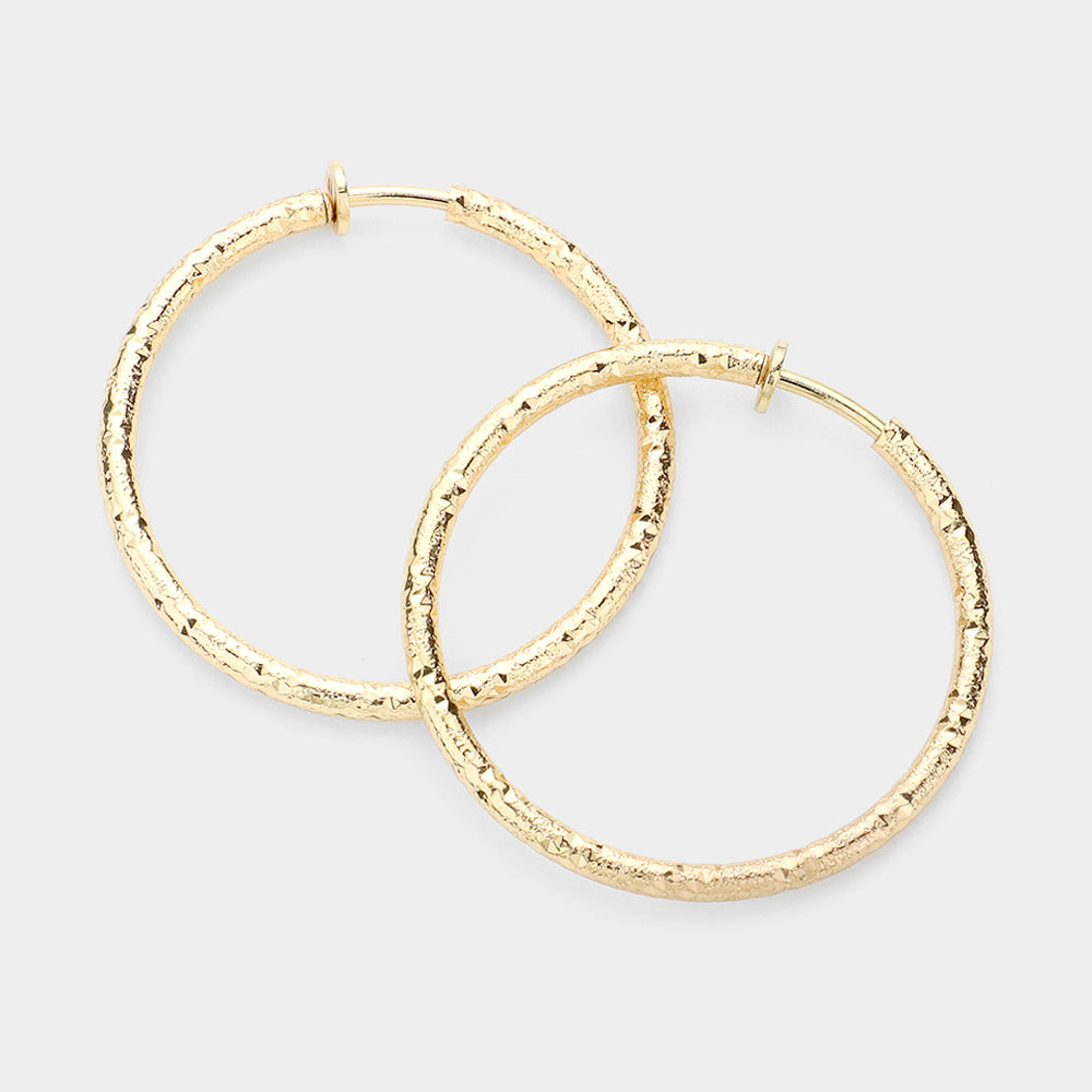 Madeline Love Gold Textured Metal Clip On Hoop Earrings