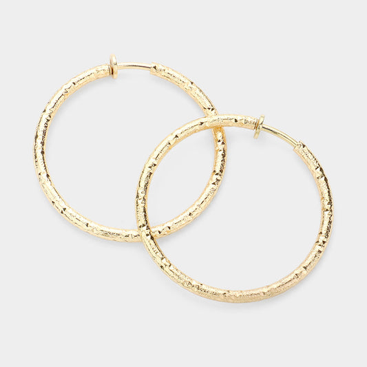 Madeline Love Gold Textured Metal Clip On Hoop Earrings