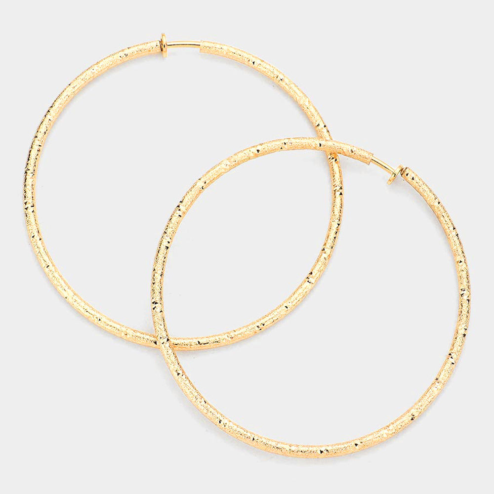 Madeline Love Gold 3.2 Inch Textured Metal Hoop Clip On Earrings