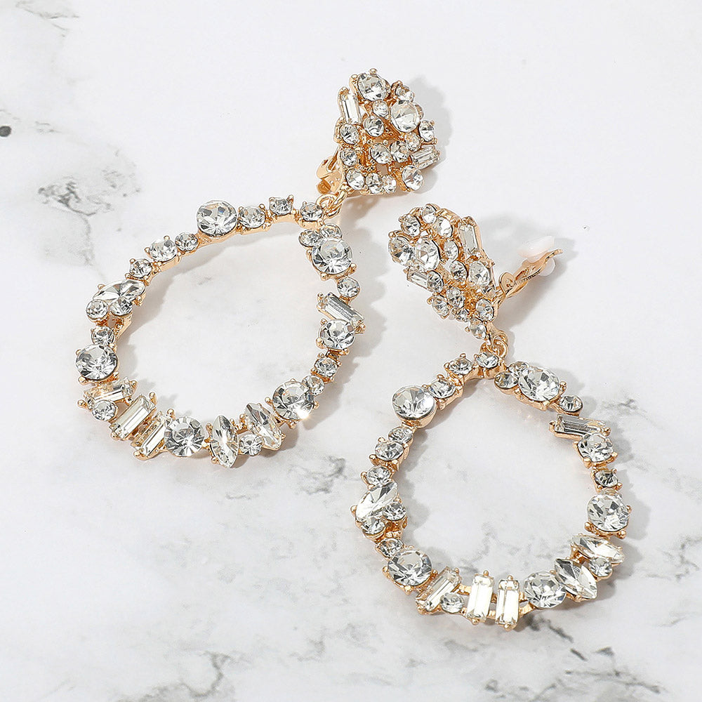 Madeline Love Clear, Gold Bold Mixed Shaped Stone Cluster Embellished Open Teardrop Dangle Evening Clip On Earrings