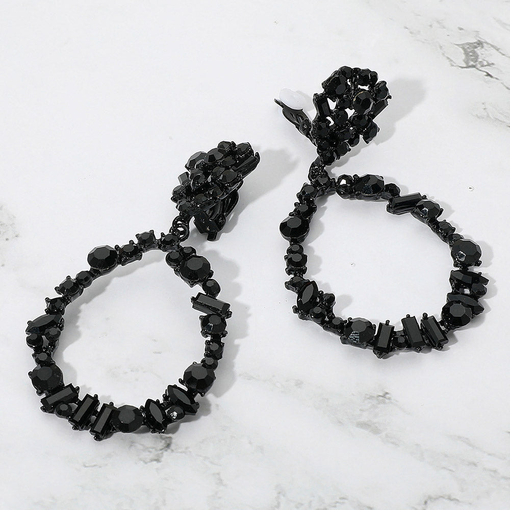 Madeline Love Jet Black Bold Mixed Shaped Stone Cluster Embellished Open Teardrop Dangle Evening Clip On Earrings