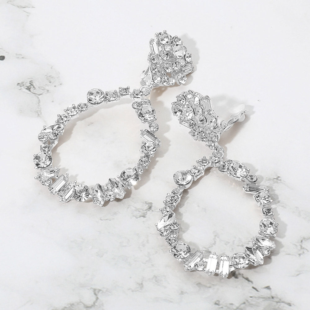 Madeline Love Clear, Silver Bold Mixed Shaped Stone Cluster Embellished Open Teardrop Dangle Evening Clip On Earrings