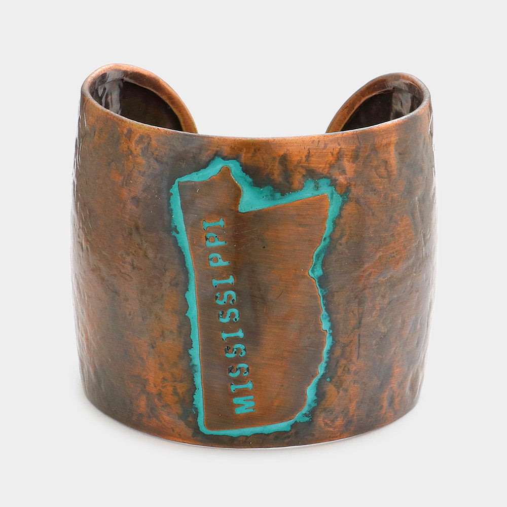 Madeline Love Copper Burnished Mississippi State Map Hammered Wide Metal Cuff Bracelet - Bracelets