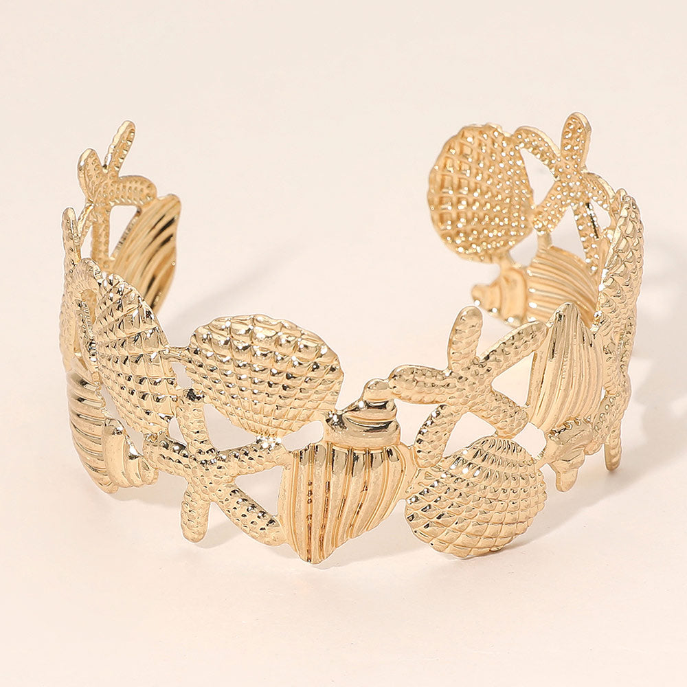 Madeline Love Worn Gold Textured Metal Seashell Starfish Open Cuff Bracelet