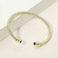 Madeline Love Black, Gold 14K Gold Plated CZ Stone Tip Twisted Cable Cuff Bracelet - Hair Accessories