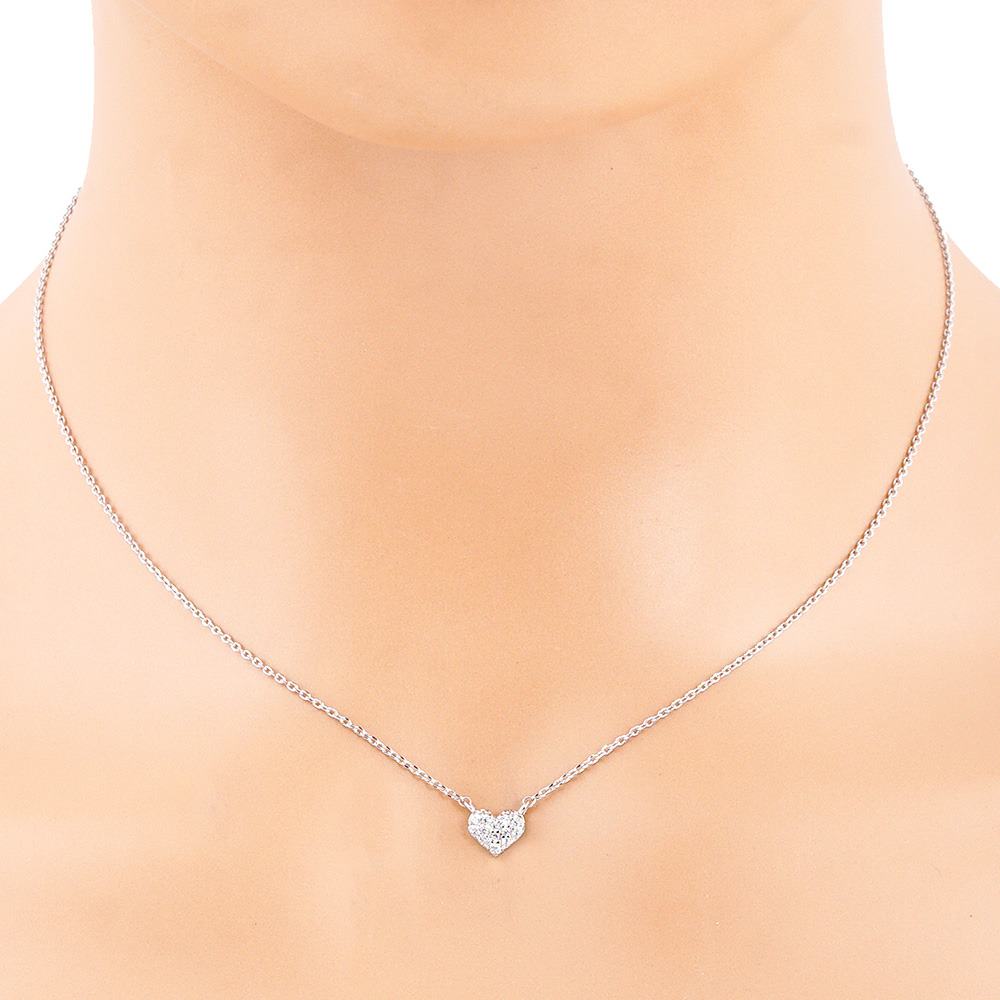 CZ Stone Paved Heart Pendant Necklace exudes elegance and charm. Crafted with precision and adorned with sparkling CZ stones, it brings a touch of glamour to any outfit. Featuring an intricate heart design, it symbolizes love and affection, making it a perfect gift for someone special. 