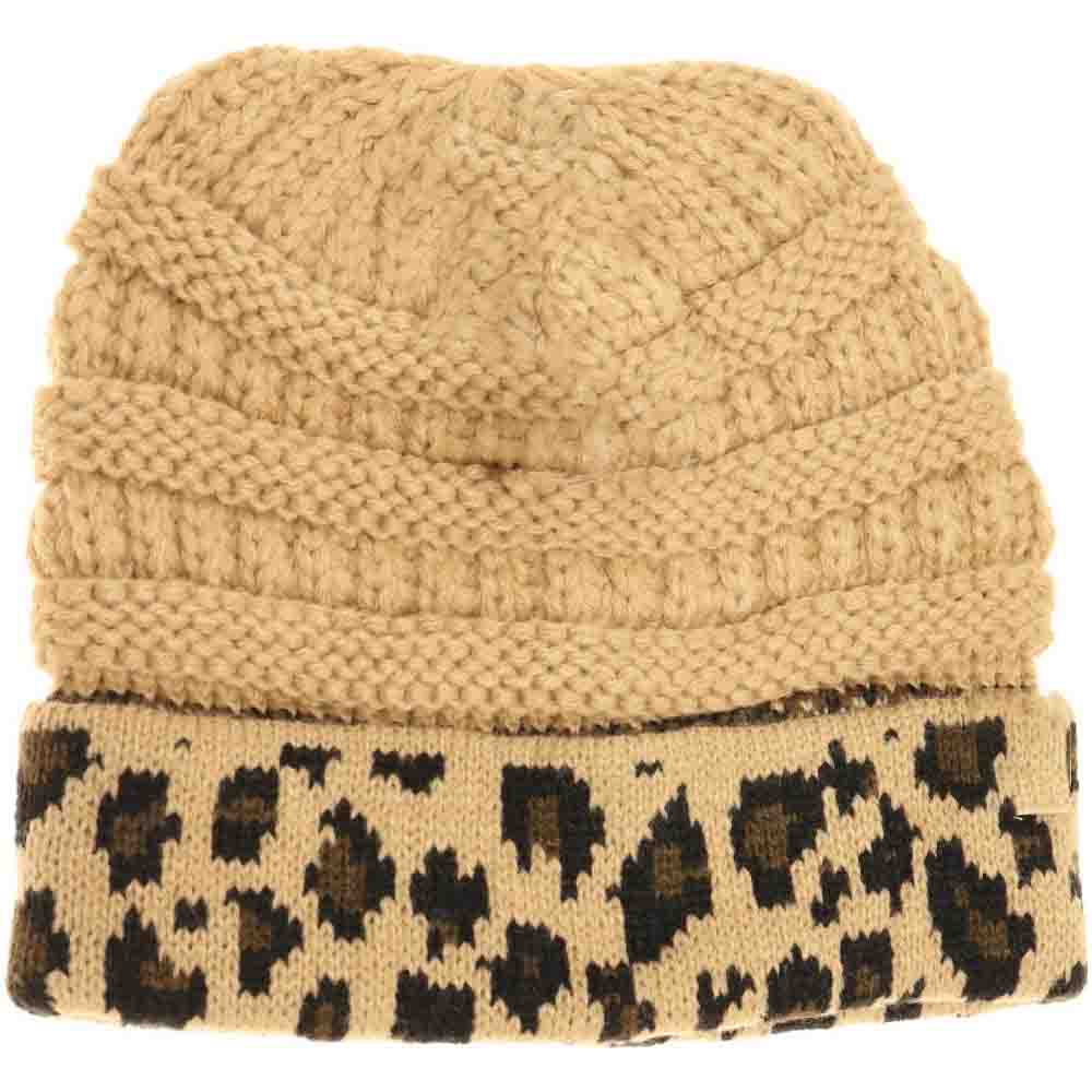 Camel Kids Matching Cuff Leopard Print CC Beanie combines playful style with cozy warmth. Crafted from a soft knit fabric, this piece features a trendy leopard print pattern and a folded cuff accented by the classic CC logo. Ideal for chilly days, it keeps little heads comfortable while adding a fashionable touch to any outfit. Perfect for matching with adult styles, this beanie offers both practicality and a chic edge for young fashion enthusiasts. 