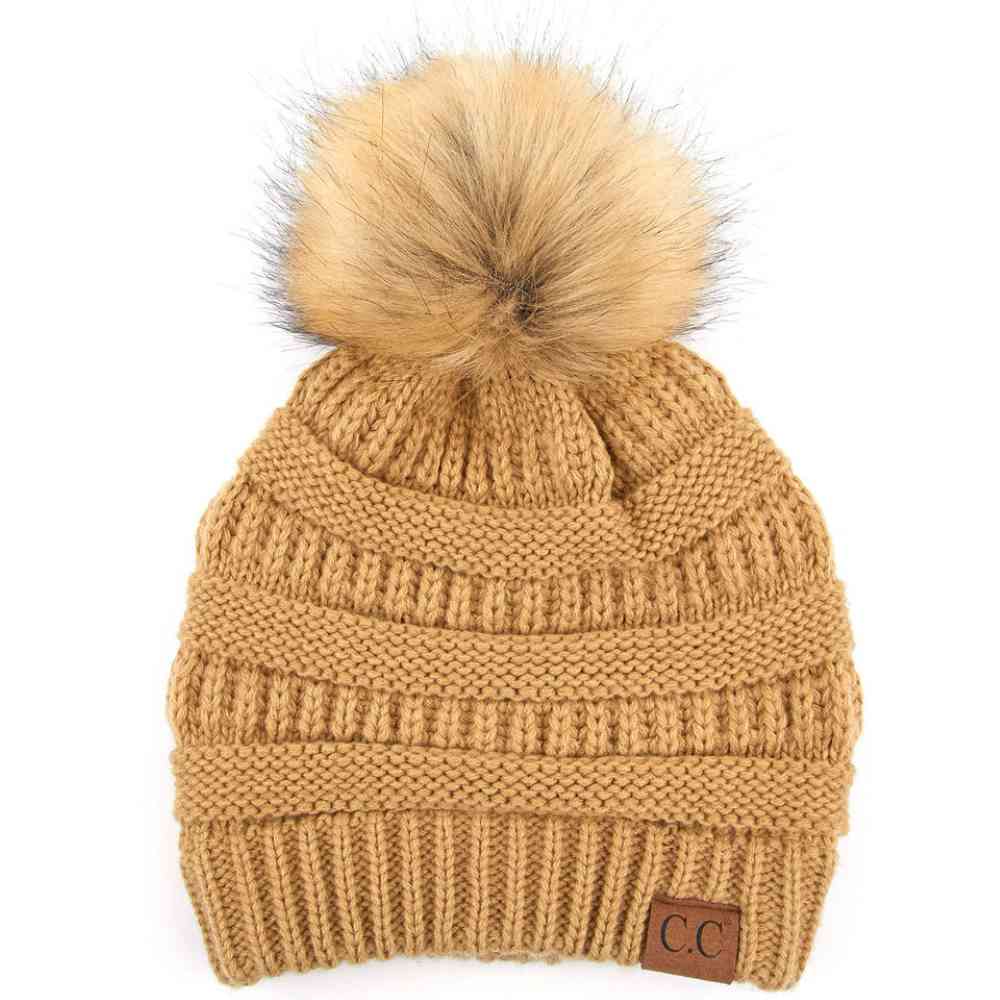 Camel Stay warm and cozy with this classic C.C Pom Pom Knit Beanie, crafted from 100% soft acrylic for all-day comfort. The ribbed knit design adds texture and durability, while the signature pom pom on top brings a playful touch to any winter outfit. One size fits most, making it the perfect accessory for everyone. Ideal for cold weather adventures or casual everyday wear.