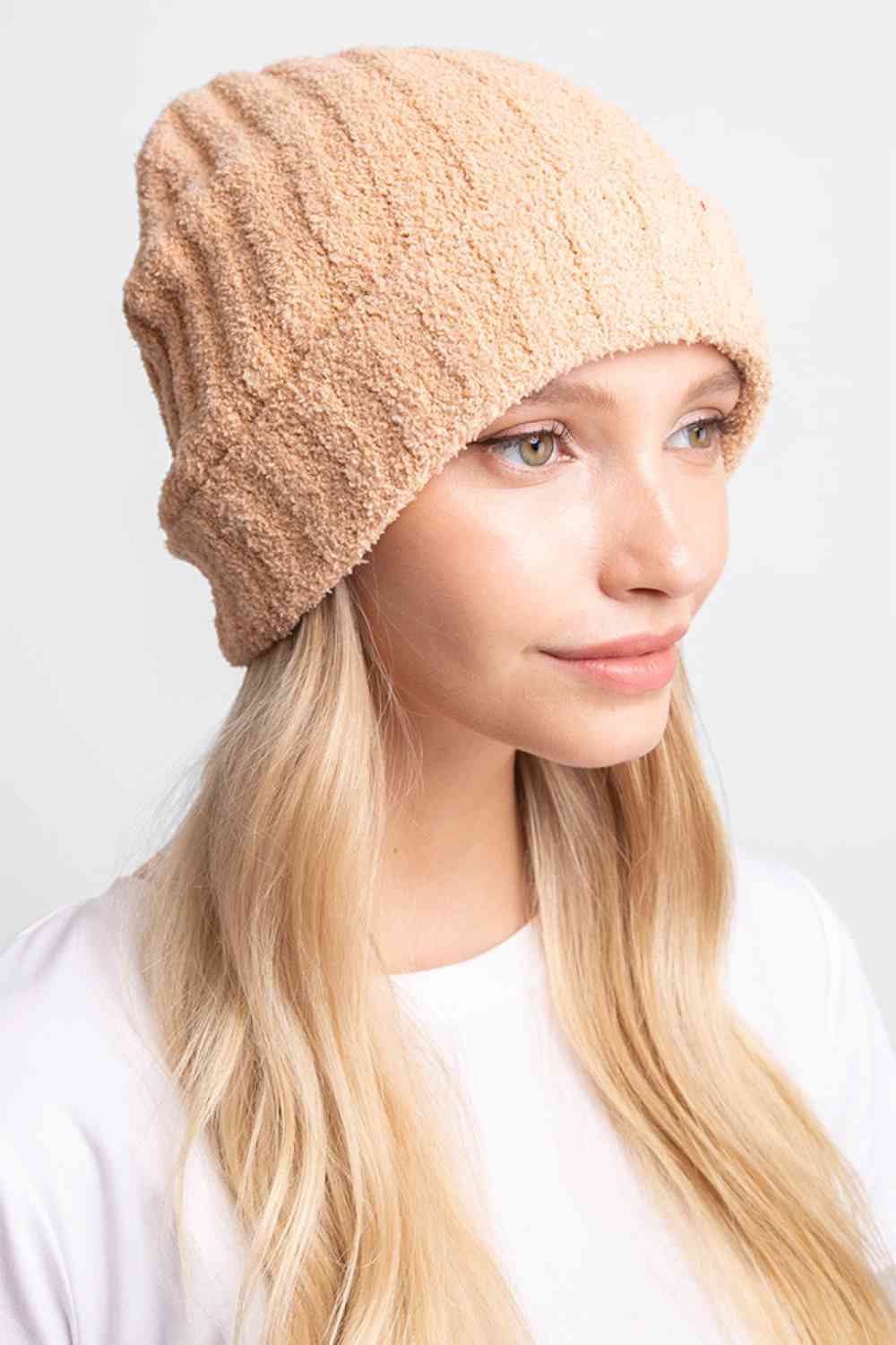 Camel Stay warm and comfortable with this Ribbed Solid Beanie, crafted from 100% poly microfiber for a soft, durable fit. The classic ribbed knit design offers timeless style that pairs effortlessly with any winter outfit.