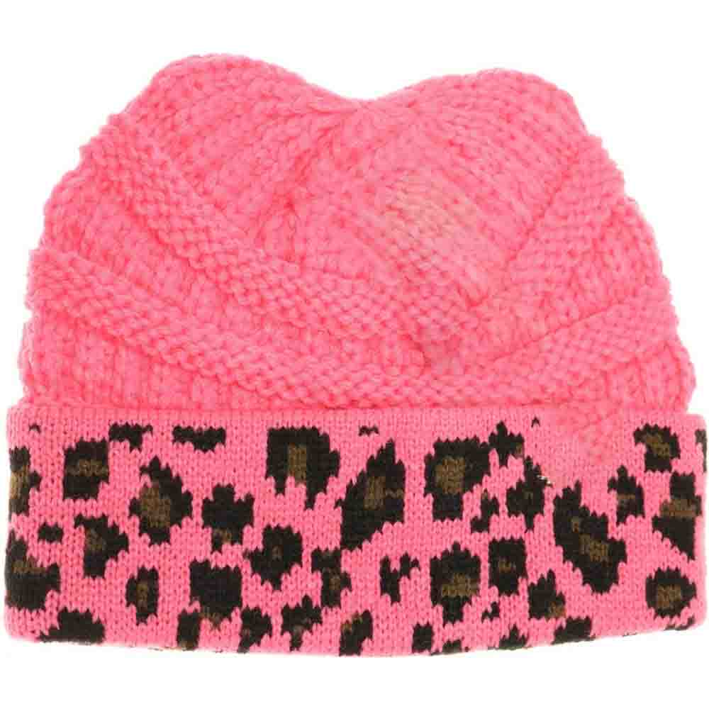 CandyPink Kids Matching Cuff Leopard Print CC Beanie combines playful style with cozy warmth. Crafted from a soft knit fabric, this piece features a trendy leopard print pattern and a folded cuff accented by the classic CC logo. Ideal for chilly days, it keeps little heads comfortable while adding a fashionable touch to any outfit. Perfect for matching with adult styles, this beanie offers both practicality and a chic edge for young fashion enthusiasts. 