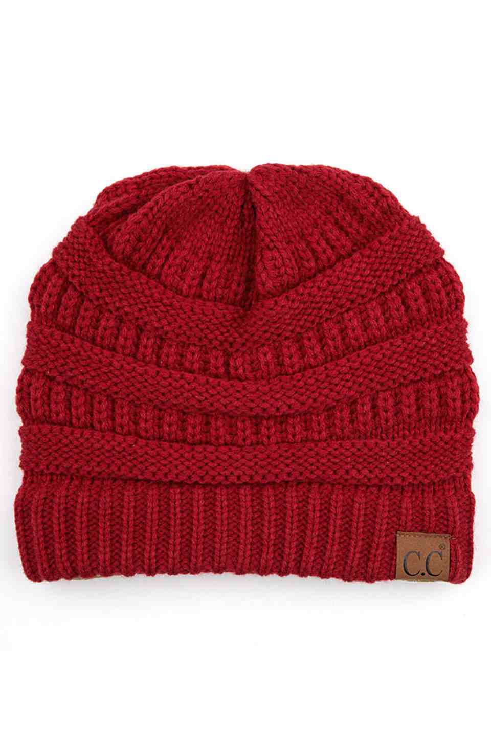 Cardinal C.C Ribbed Knit Solid Color Beanie offers a timeless design with durable ribbed knitting, ensuring a snug and comfortable fit. Crafted for warmth and versatility, this beanie is perfect for everyday wear, providing reliable protection against cold weather while maintaining a sleek, minimalist style that complements any outfit. Its solid color adds understated appeal, making it an essential accessory for both casual and outdoor use. 