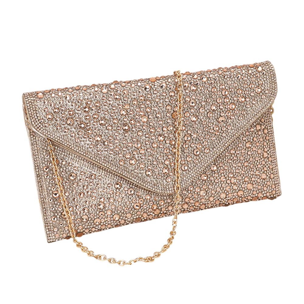 Champagne Bling Stone Studded Clutch Bag doubles as a crossbody bag as well, making it a versatile and stylish choice for any evening occasion. The bling stones add a touch of glamour, while the flap envelope design keeps your belongings secure. Perfect for a night out, this bag will elevate any outfit.